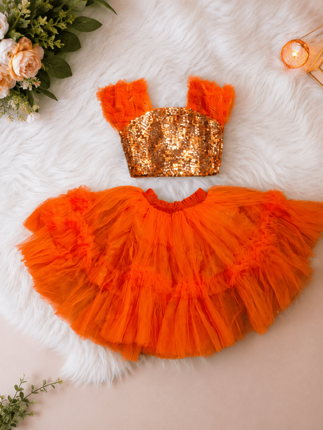 Orange siquined top with layered skirt