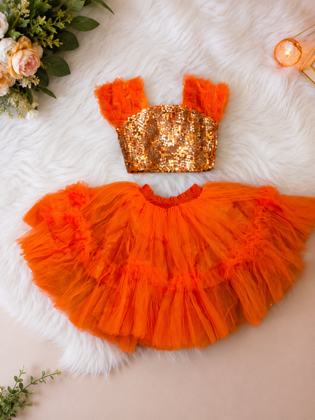 Orange siquined top with layered skirt